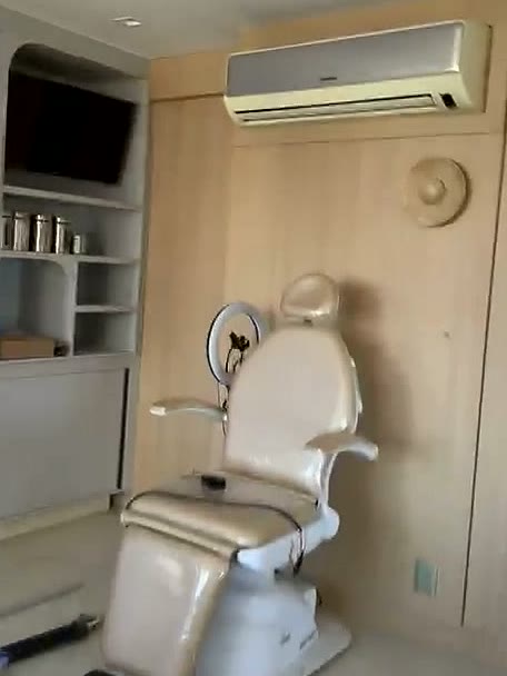 Sala de exame do consultório de Lafaiete
